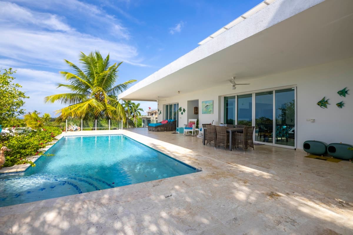 Luxury Hillside Home with Ocean Views For Sale - Image 1